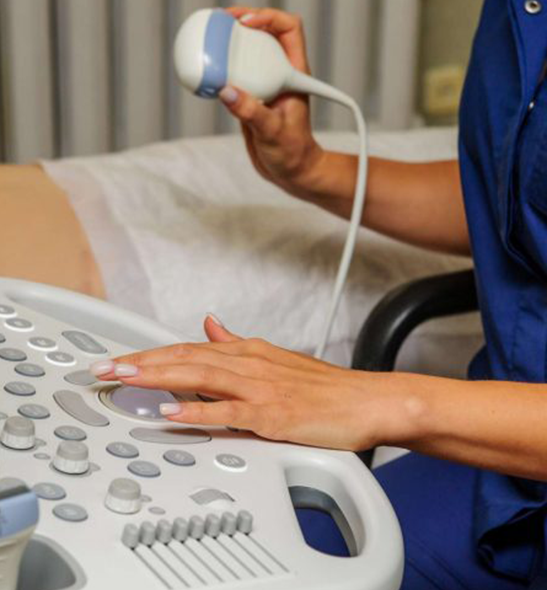 person holding ultrasound equipment