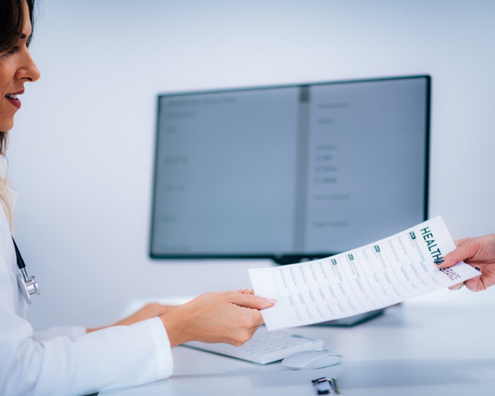 doctor-carefully-collecting-healthcare-data