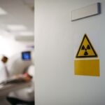 radiation-risk-sign-on-door-behind-calcium-scan